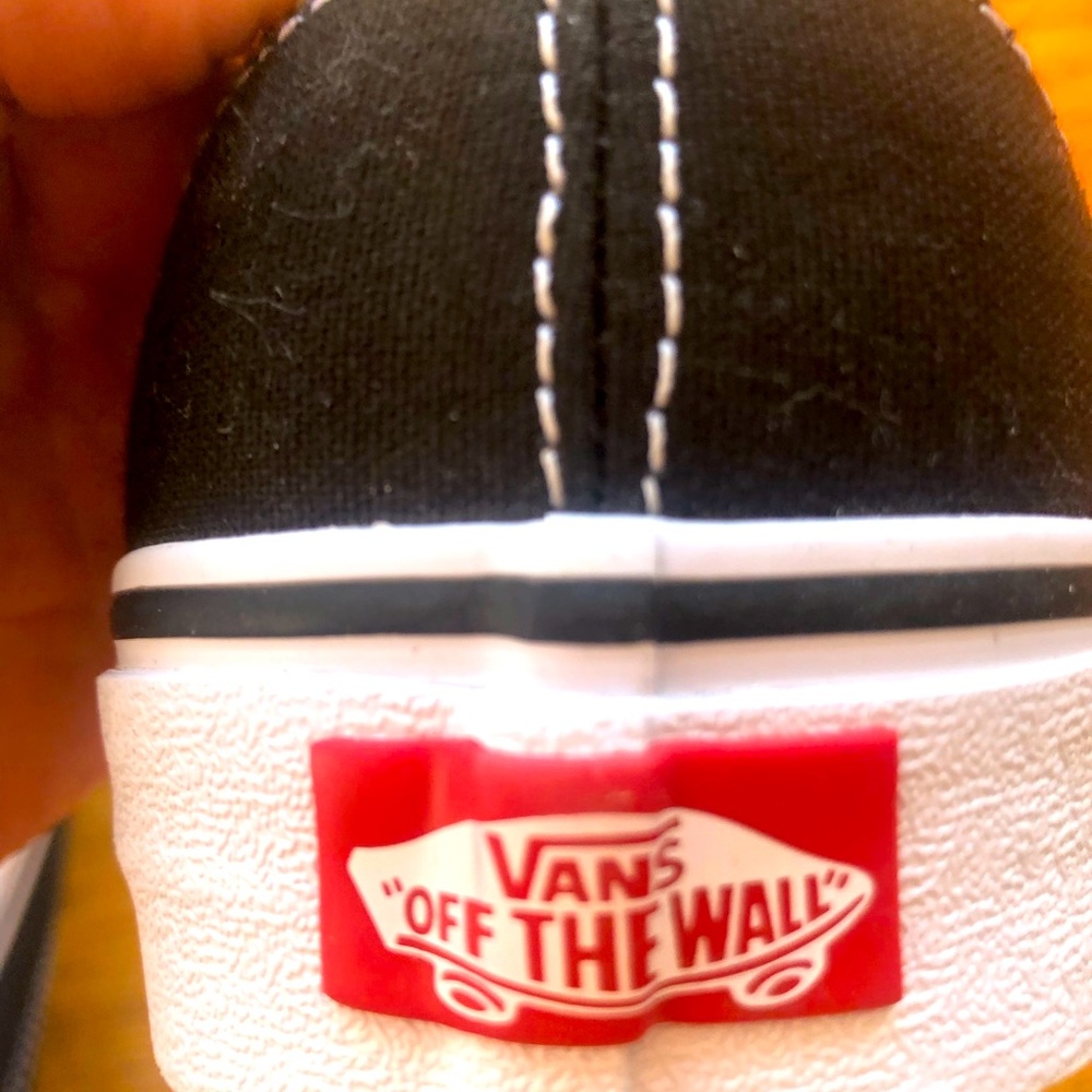 VANS NWOT low rise unisex black Vans. Size 9 Men, size 10.5 W. Never worn.
